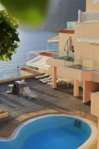 a rendering of a resort with a swimming pool at Buenavista in Acantilado de los Gigantes