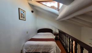 Voodi või voodid majutusasutuse Hotel Cusco Plaza Saphi toas