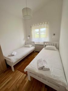 Postel nebo postele na pokoji v ubytování Divine House