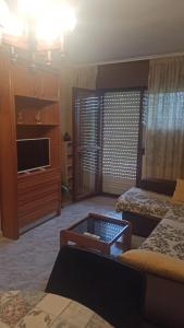 A bed or beds in a room at Skala