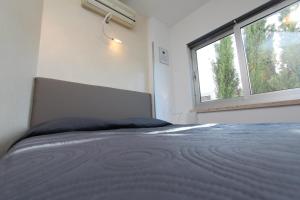 Postel nebo postele na pokoji v ubytování Apartment Lycia