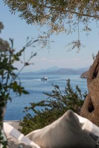 a boat on a large body of water at The Anchor House in Symi
