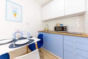 Kuchyň nebo kuchyňský kout v ubytování Balaton Wave Apartments