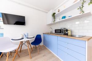 Kuchyň nebo kuchyňský kout v ubytování Balaton Wave Apartments