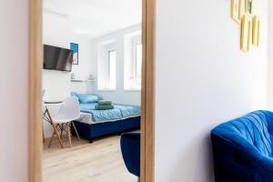 TV a/nebo společenská místnost v ubytování Balaton Wave Apartments
