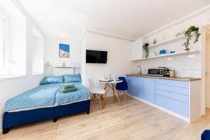 Kuchyň nebo kuchyňský kout v ubytování Balaton Wave Apartments