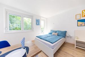 Postel nebo postele na pokoji v ubytování Balaton Wave Apartments