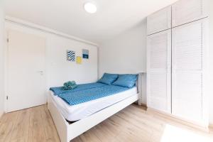 Postel nebo postele na pokoji v ubytování Balaton Wave Apartments