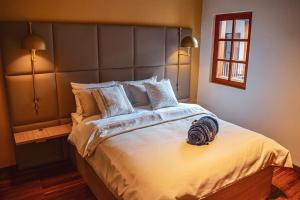 Postel nebo postele na pokoji v ubytování Casa Dreamer Bogotá