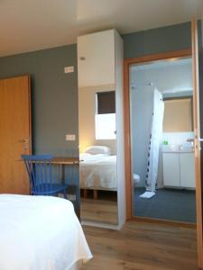 Seydisfjördur Guesthouseにあるベッド