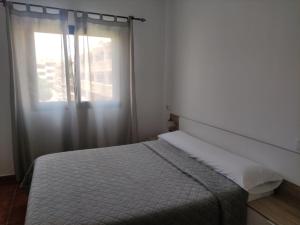 Ein Bett oder Betten in einem Zimmer der Unterkunft Atlanterra - Mar de Plata
