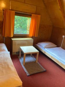 Postel nebo postele na pokoji v ubytování Chaty Marta