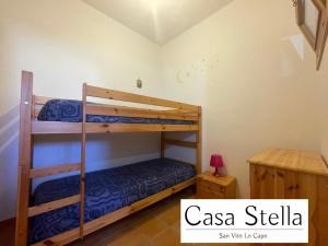 a bedroom with two bunk beds in a room at Casa Stella San Vito Lo Capo in San Vito lo Capo