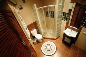Kúpeľňa v ubytovaní Atena - Pantheon Apartments
