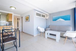 a living room with a couch and a table at Loixana 11-7 Apartment Levante Area in Benidorm