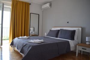 Posteľ alebo postele v izbe v ubytovaní Apartman Oneum