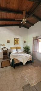 Ένα ή περισσότερα κρεβάτια σε δωμάτιο στο Puerto Colla