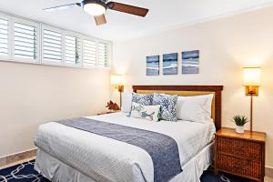 a bedroom with a bed and a ceiling fan at Napili Shores F150 in Napili-Honokowai
