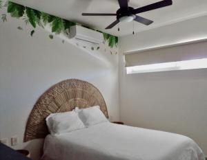 Postel nebo postele na pokoji v ubytování Condominio en la Riviera Maya + 11 fotografií