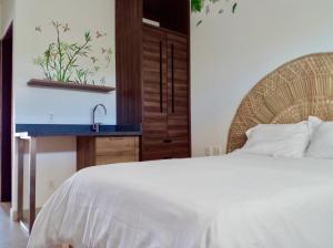 Postel nebo postele na pokoji v ubytování Condominio en la Riviera Maya