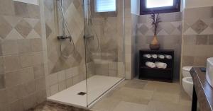 a shower with a glass door in a bathroom at CasaSignorina in Leuca +46 photos