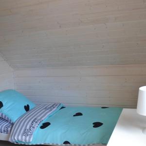 Voodi või voodid majutusasutuse Domki I apartamenty Mila toas +2 fotot