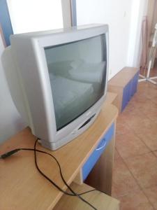 a computer monitor sitting on top of a desk at Villa Poliana in Sveti Vlas