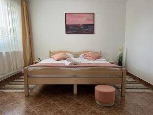 A bed or beds in a room at House75