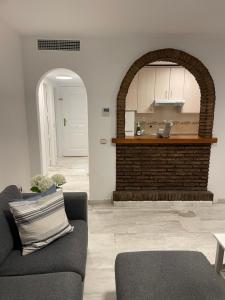 Гостиная зона в Jardines Apartment