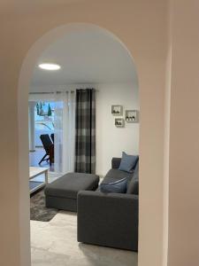 Гостиная зона в Jardines Apartment