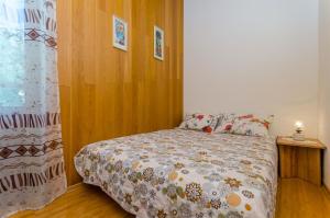 Postel nebo postele na pokoji v ubytování House Blanka