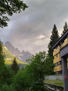 a view of the mountains from a building at Appartamento I Larici in Folgarida