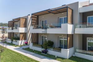 an image of a house with balconies at Val Del Mar in Skala Fourkas