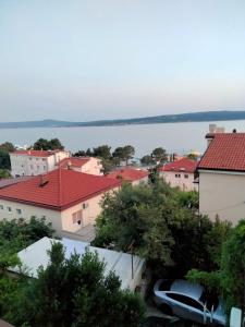 a view of a city with houses and a lake at SilvioDino in Crikvenica