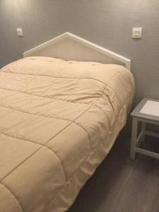 En eller flere senge i et værelse på Appartement montagne Valmeinier 1800