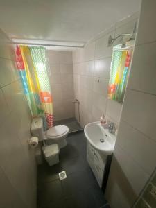Koupelna v ubytování Kelesi Apartments + 17 fotografií