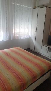 Postel nebo postele na pokoji v ubytování Apartmani Borko 3-3