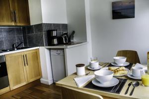 A cozinha ou cozinha compacta de Culver House Hotel