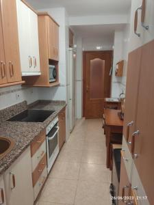 Η κουζίνα ή μικρή κουζίνα στο Apartamento VILLA INÉS parking y wifi gratis