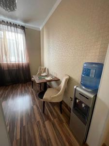 TV a/nebo společenská místnost v ubytování Апартаменты в центре города в ЖК Арман