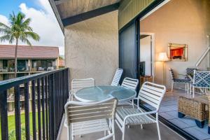 En balkon eller terrasse på Papakea D404