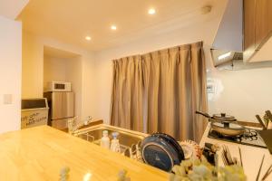 Dapur atau dapur kecil di 駒込駅徒歩7分/旧古河庭園至近(100m)の4LDKマンション「92m2」