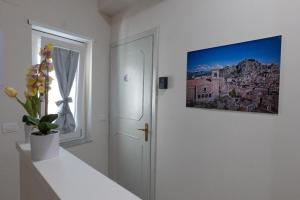 a room with a door and a picture on the wall at Umberto I Nicosia in Nicosia