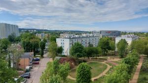 a view of a city with a park and buildings at Apartament SEASIDE Gospody 5a in Gdańsk