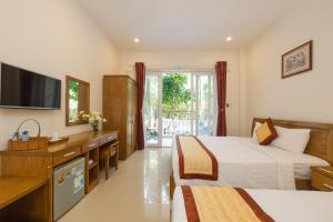 TV a/nebo společenská místnost v ubytování T&T Resort and Spa Phu Quoc