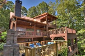 a large wooden house with a wrap around deck at Bella Vista in Ellijay