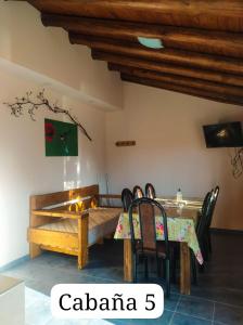 a dining room with a table and chairs at San Rafael in San Rafael