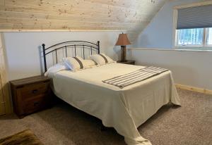 Säng eller sängar i ett rum på Bodin's Resort