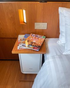 Postel nebo postele na pokoji v ubytování 盤古捷旅 - Panco Hotel