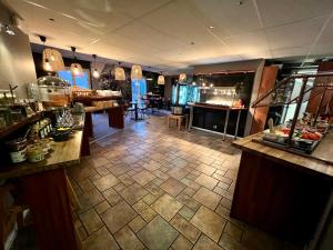 Kuchyň nebo kuchyňský kout v ubytování Hotell Siesta